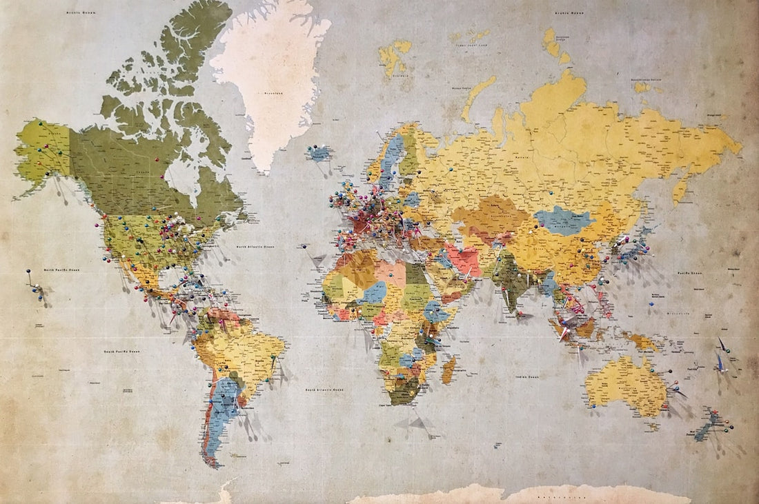 Old world map with vintage compass and aged paper